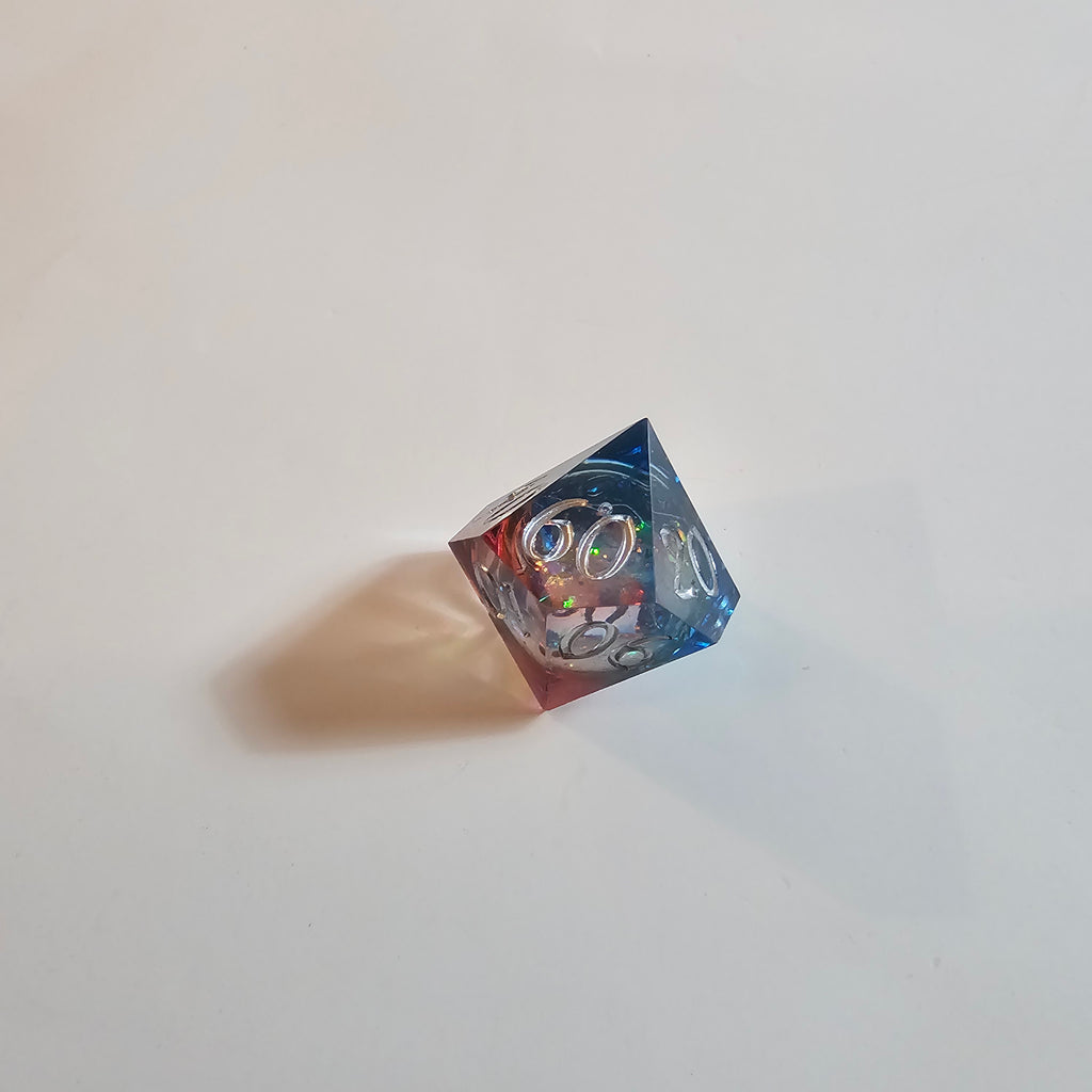 Set di dadi in resina con nucleo liquido Cosmic Firestorm