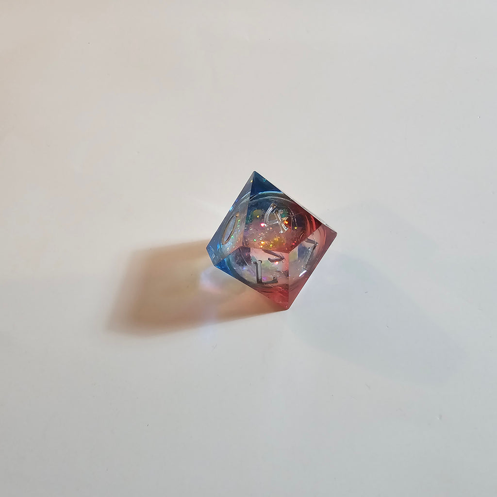 Set di dadi in resina con nucleo liquido Cosmic Firestorm