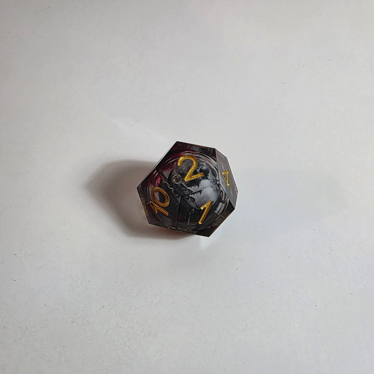 Set de dados de resina con núcleo líquido de calaveras sangrientas