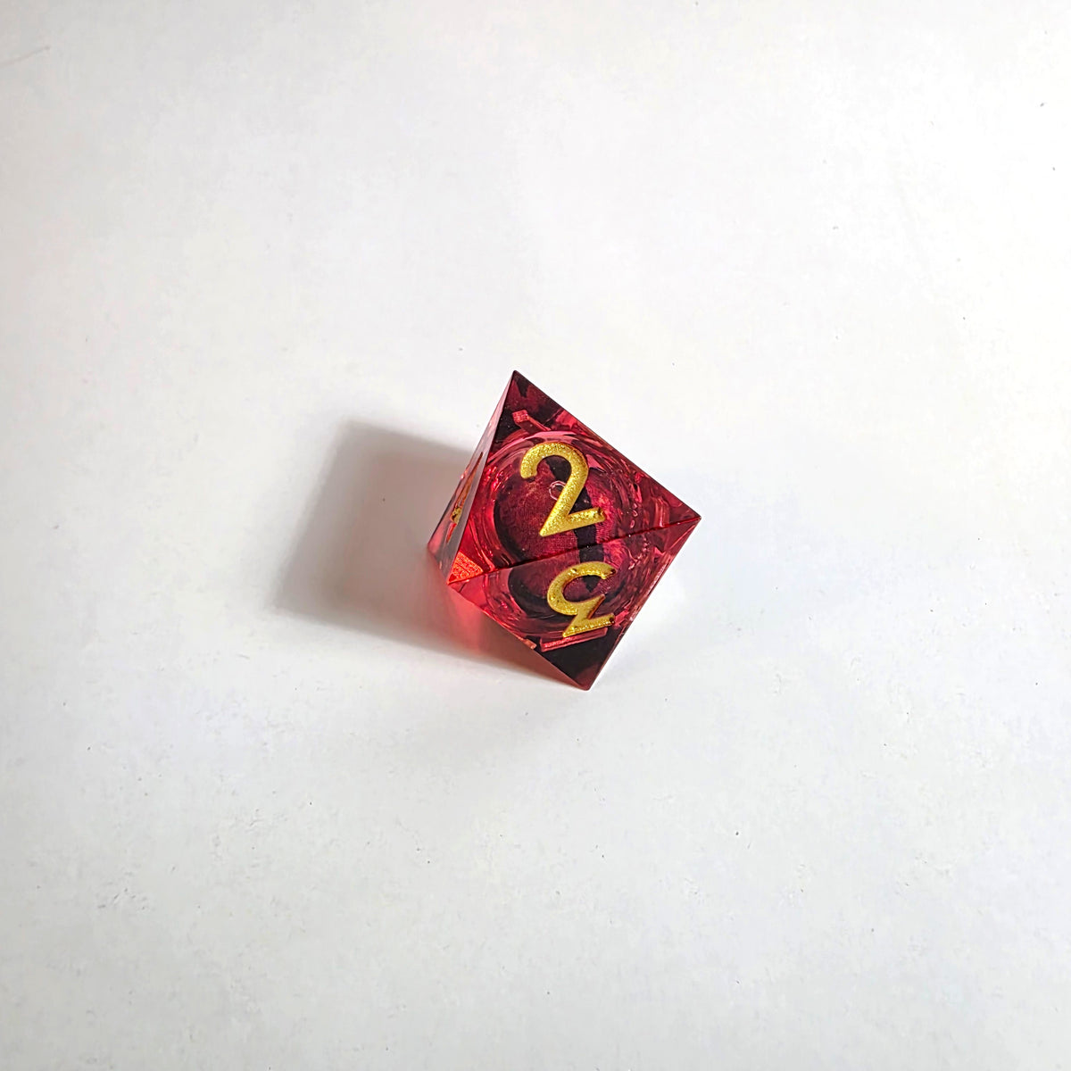 Juego de dados de resina con núcleo líquido Ojo de Dragón Rojo