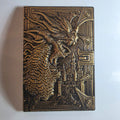 Cuaderno de dragón de latón