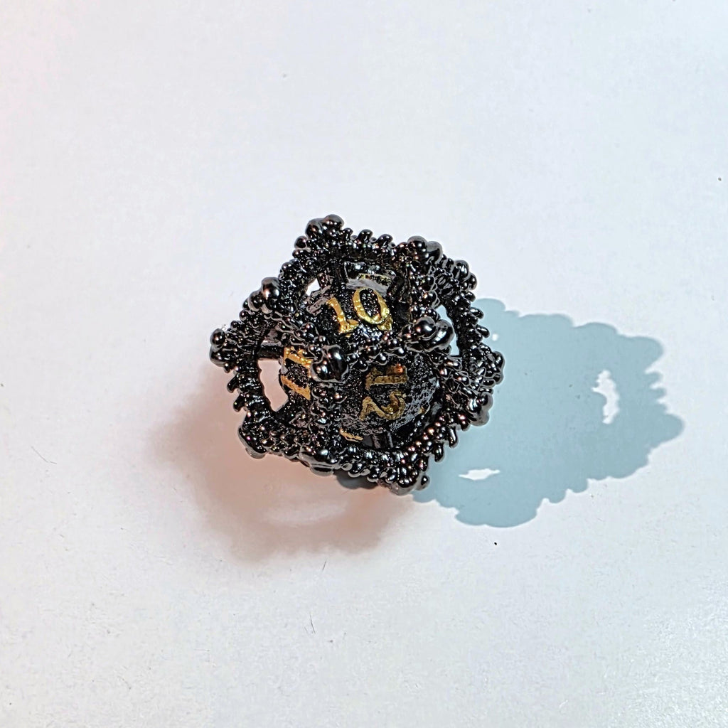 Drachenei-Würfelset aus hohlem Metall in Schwarzgold