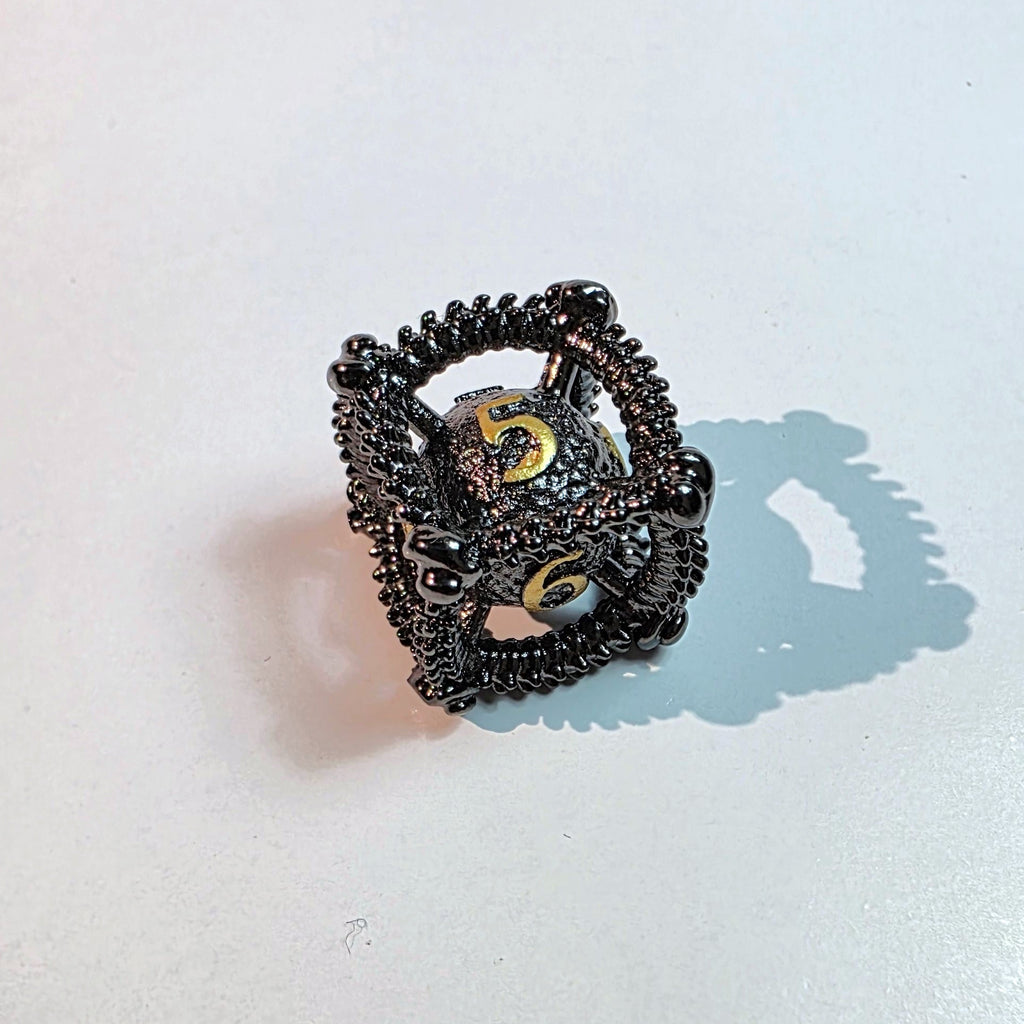 Drachenei-Würfelset aus hohlem Metall in Schwarzgold