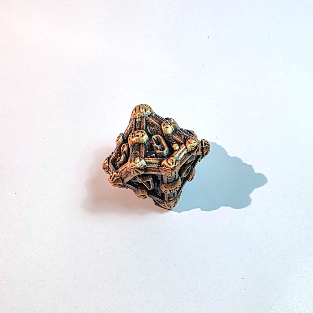 Jeu de dés en métal massif doré vieilli Deathmask