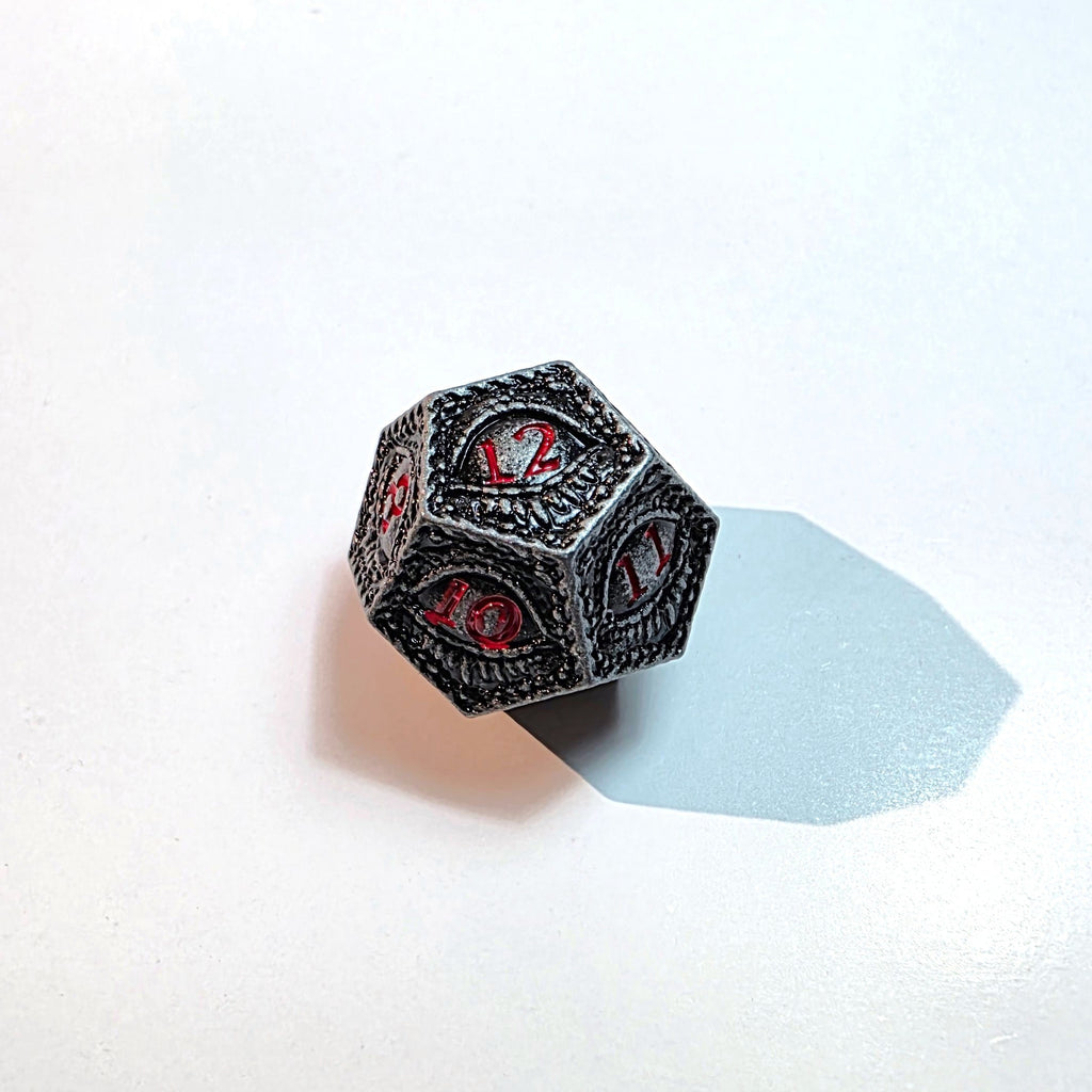 Set di dadi in metallo pieno Black Eye