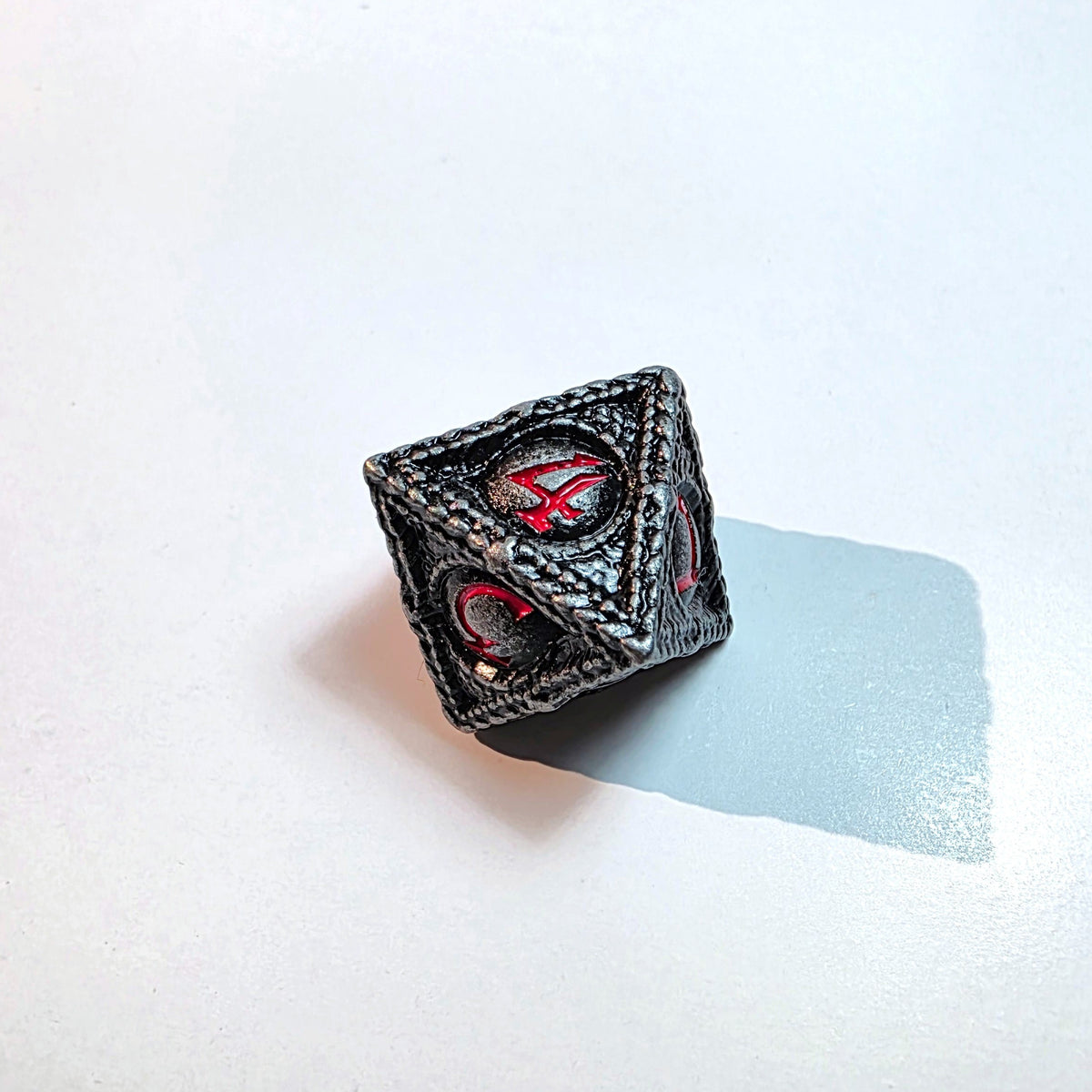 Set di dadi in metallo pieno Black Eye