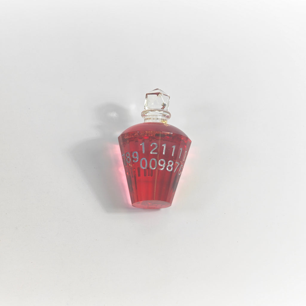 Trankflasche mit roter Folie