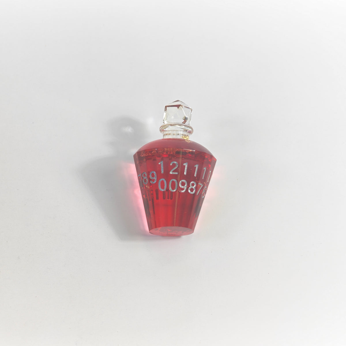 Trankflasche mit roter Folie