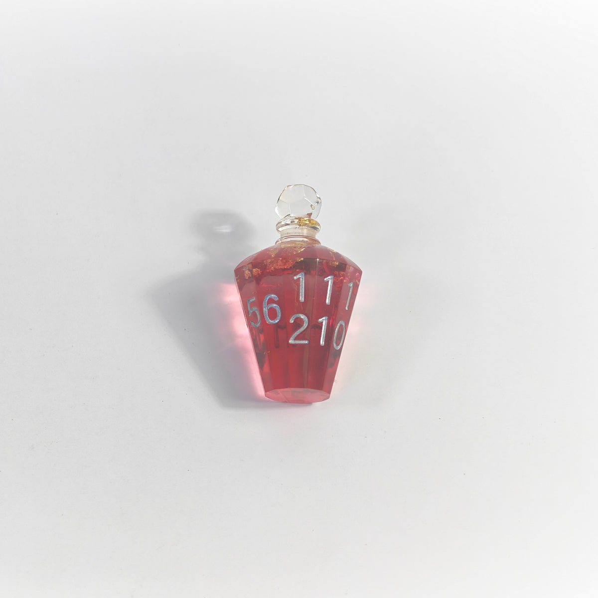 Trankflasche mit roter Folie