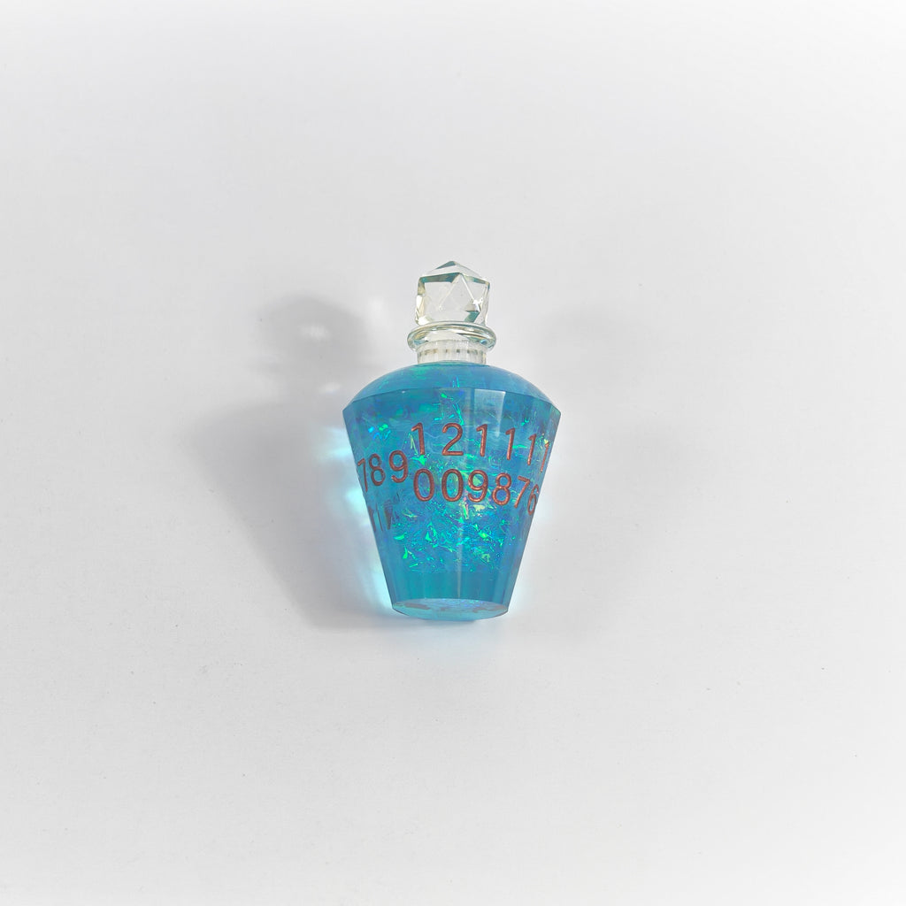 Blaue Glitzer-Zaubertrankflasche